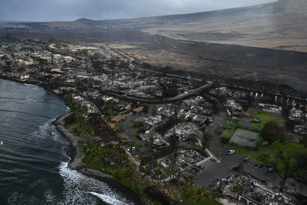 An aerial view shows destruction caused by a wildfire in Lahaina, on the Hawaiian island of Maui, on August 10, 2023. - At least 36 people have died after a fast-moving wildfire turned Lahaina to ashes, officials said August 9, as visitors asked to leave the island of Maui found themselves stranded at the airport. The fires began burning early August 8, scorching thousands of acres and putting homes, businesses and 35,000 lives at risk on Maui, the Hawaii Emergency Management Agency said in a statement. 